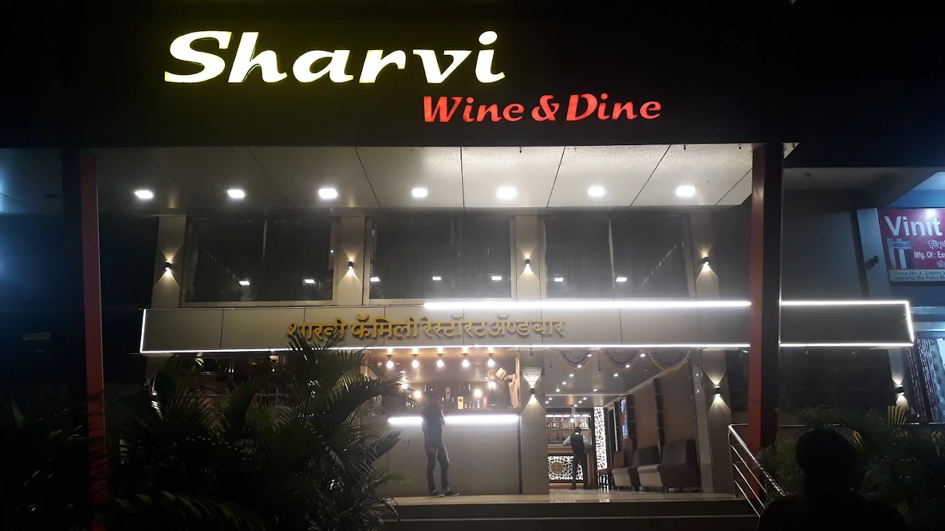 Sharvi Wine & Dine logo